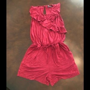 Ruffled tank romper, faux wrap neckline.  Size small.  Dark raspberry color.